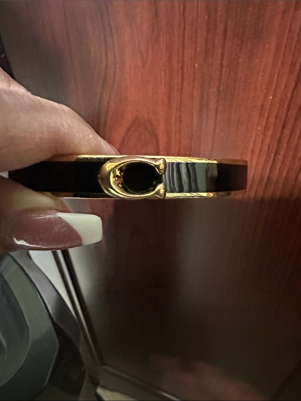 Coach Black and Gold Enamel Cuff Bracelet